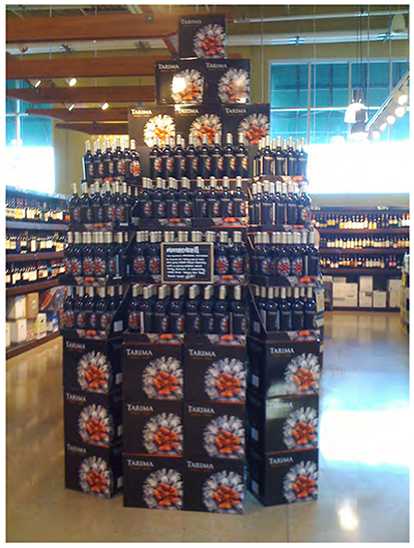 Another example of a large wine case stack, the display was constructed by the supermarket, attracting customers by the strong branded graphic it naturally creates.