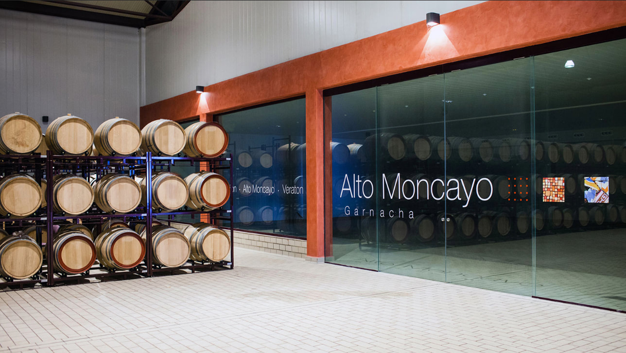 Graphics remind visitors of the Alto Moncayo brand , while alerting staff to the newly installed walls 